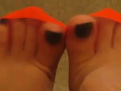 Feet In Orange Stockings Point Of VIew