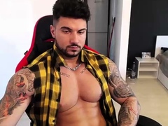 Hot gay with big muscles masturbates