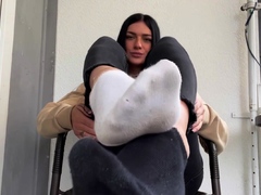 Brunette with foot fetish rubs big dick with her feet in POV